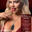 10X Vibrating Silicone Teardrop Necklace displayed on a model with red lips, highlighting its sleek design and wearable functionality.