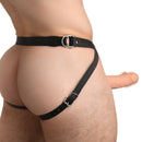 Size Matters 2 Inch Vibrating Silicone Penis Sheath Flesh worn with a harness, highlighting enhanced length and girth.