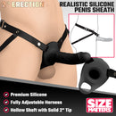 2 Inch Erection Realistic Silicone Penis Sheath Black displayed on a harness for enhanced partnered play.