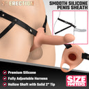 2 Inch Erection Smooth Silicone Penis Sheath Light with adjustable harness and solid 2 inch tip for enhanced pleasure.