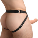 2 Inch Erection Smooth Silicone Penis Sheath Light secured with a black adjustable harness on a model.