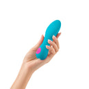 Femme Funn Solia Bullet Flat Tipped Vibrator Turquoise held in hand, showcasing its ergonomic design and color.