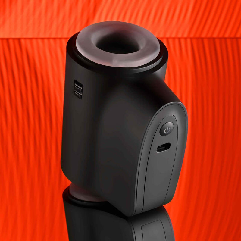 Playboy Come Along Travel-Sized Stroker with Dual Entry and 7 Speeds in Black on Red Background