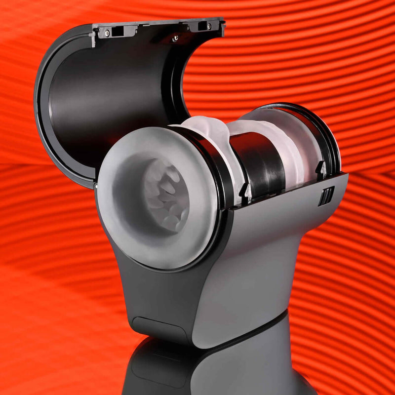 Playboy Come Along Travel-Sized Stroker showcasing dual entries and sleek design for on-the-go pleasure, displayed against a vibrant orange background.