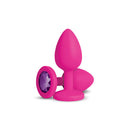 Gemma Purple Gem Pink Silicone Anal Plug Small with a pink silicone body and a purple acrylic gemstone.