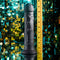 Evolved Black Thunder internal massager with beads and remote control next to a ruler for size comparison.