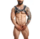 Male Basics Dngeon Classic Belt Harness Black being worn by a muscular model, showcasing bold design and stylish craftsmanship.
