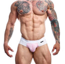 Model showcasing Male Basics Spot Brief White Small, designed for comfort and breathability with sporty style.