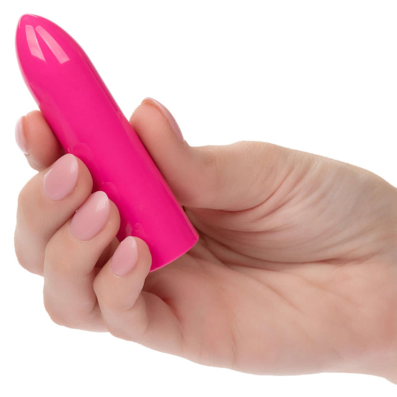 Hand holding Turbo Buzz™ Classic Bullet Pink 10-function compact powerful vibrator
