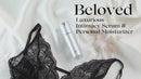 Beloved Luxurious Intimacy Serum 15 ml beside black lace lingerie and flower petals.