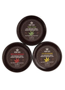 Earthly Body Hemp Seed 3-in-1 Massage Candle Holiday Trio featuring Tinsel Tease, Mistletoe Mischief, and Yule Be Begging.
