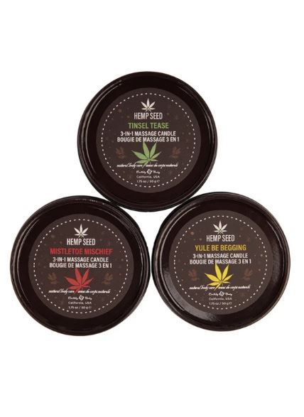 Earthly Body Hemp Seed 3-in-1 Massage Candle Holiday Trio featuring Tinsel Tease, Mistletoe Mischief, and Yule Be Begging.