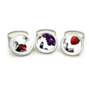 Earthly Body Edible Massage Candle 3 Pack showcasing Cherry, Grape, and Strawberry scented candles.