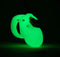 Glow-in-the-dark chastity kit in green light, featuring a compact 1.75-inch cage for discreet wear and nighttime fun.