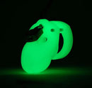 Glow-in-the-dark Mr. Stubb chastity kit with compact 1.75” cage and lock, designed for discretion and intimate control.