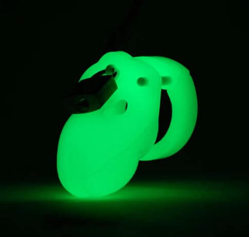 Glow-in-the-dark Mr. Stubb chastity kit with compact 1.75” cage and lock, designed for discretion and intimate control.