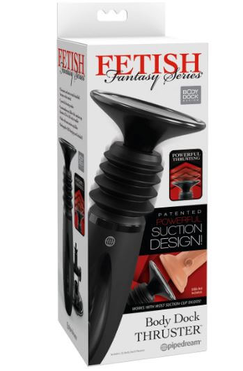 Fetish Fantasy Body Dock Handheld Thruster - Black in packaging, showcasing its powerful thrusting modes and suction design.