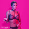 Woman wearing Euphoria Chain Halter Collar & Leash - Premium Multi-Chain Harness from CalExotics in a bold, vibrant setting.