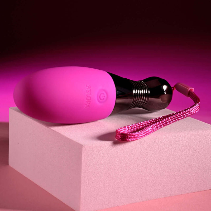 Selopa Companion powerful USB rechargeable vibrating egg with 10 speeds and patterns in sleek silicone oval shape on display.