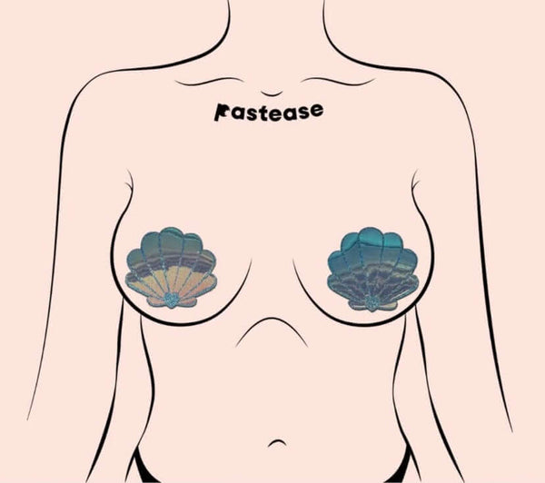 Model wearing Pastease Opalescent Seafoam Blue Seashell Pasties, mermaid-inspired beachwear accessory.