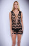Black lace mini dress with front cutout design, featuring intricate fishnetting and sheer fabric, showcasing elegant and seductive style.