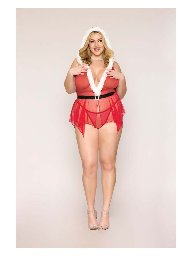 Plus-size model in North Pole Hottie Santa-themed mesh babydoll set with faux-fur trimmed hood and halter neckline by Dreamgirl.