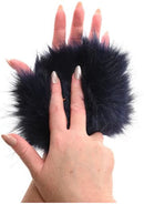 Luxurious blue faux fur glove with hidden gold spikes for sensory exploration. Perfect for teasing and excitement in intimate moments.
