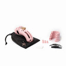 CBX The Curve pink chastity cock cage kit with accessories and pouch for secure and comfortable wear.