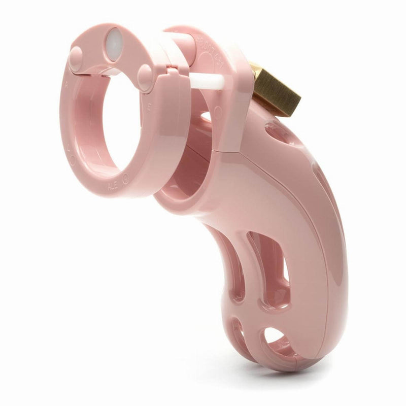 CBX The Curve pink chastity cock cage kit showcasing its innovative design and secure locking mechanism.