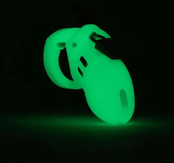 CB-6000S Glow-in-the-Dark Chastity Kit, Locktober 2024 Edition, illuminated in dark environment.