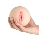 Cutiepies Hannahs Handful Pussy and Boob Head Stroker held in hand showing its lifelike texture and design.