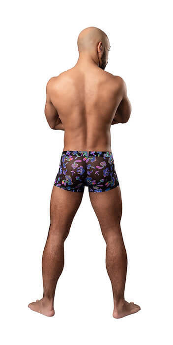 Man wearing Hazy Dayz Pouch Short Mushroom mesh briefs size Small, showcasing comfortable fit and bold design from the back.