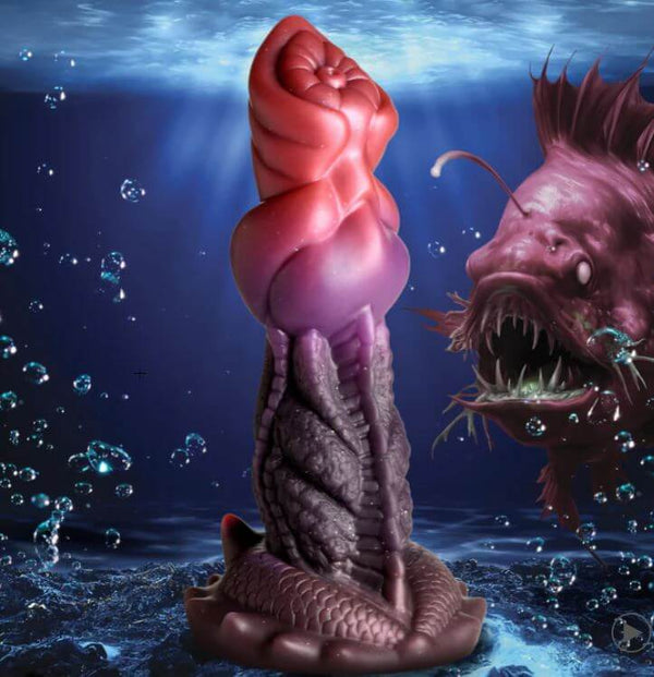 Fantasy-inspired ribbed silicone dildo with suction cup base underwater, surrounded by mythical sea creature.