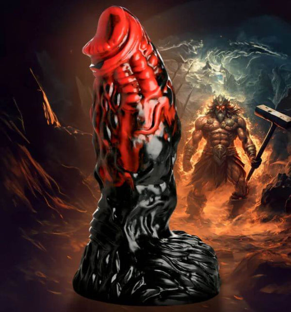 CREATURE COCKS Vulcan Silicone Dildo in fiery red and deep black with textured bumps and ridges, inspired by the Roman god of fire.