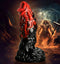 CREATURE COCKS Vulcan Silicone Dildo in fiery red and deep black with textured bumps and ridges, inspired by the Roman god of fire.