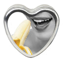 Earthly Body 3-in-1 Edible Massage Candle Banana Daiquiri heart-shaped tin with banana slice and smiling lips.