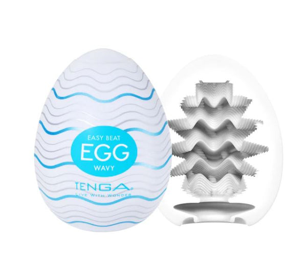 Tenga Egg Wavy Stroker displayed in an open egg-shaped shell showcasing its unique ribbed interior design.