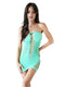 Entice Mini Cutout Dress lingerie in green on model, featuring intricate cutout design and form-fitting style.
