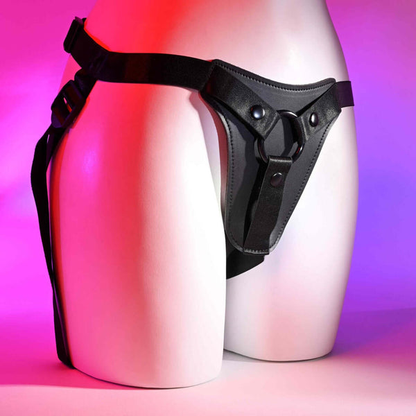 Fully Adjustable Faux-Leather Strap-On Pleasure Harness by Gender X, featuring secure waist and leg straps for ultimate intimate comfort.