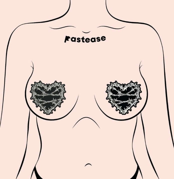 Model wearing Pastease Barbed Wire Heart Pasties Reflective Nipple Covers with stylish design and bold statement.