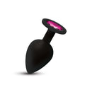 Gemma Pink Gem Black Silicone Anal Plug Large with a black silicone body and bright pink acrylic gemstone.