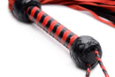Isabella Sinclaire Black and Red Suede Flogger with a textured handle and soft suede tails.
