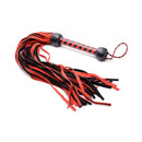 Isabella Sinclaire Black and Red Suede Flogger showcasing its soft suede tails and balanced handle.