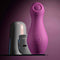 Playboy Jet Set Tapping Toy with self-charging case for clitoral stimulation against a dark background