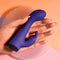 Person holding SELOPA Plum Job Petite Rabbit Vibrator with dual motors and curved shaft