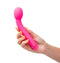 "KORA Silicone G-Spot Vibe in pink held in hand, featuring bulb-shaped head for precise stimulation, with smooth silicone coating."