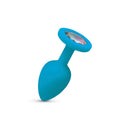 Gemma Clear Iridescent Gem Teal Silicone Anal Plug Small with round acrylic gemstone reflecting light.