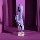 Playboy Tap Me In Rabbit Vibrator Lilac displaying bright lilac color and unique design on a vibrant purple background.