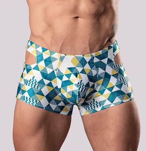 Stylish geometric cutout mini shorts with supportive pouch in blue, green, and yellow pattern.