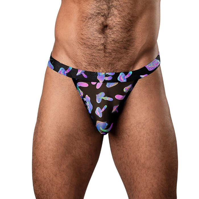 Model wearing Male Power Hazy Dayz Jock Mushroom L/XL, blacklight-responsive sheer mesh jock with psychedelic mushroom prints.